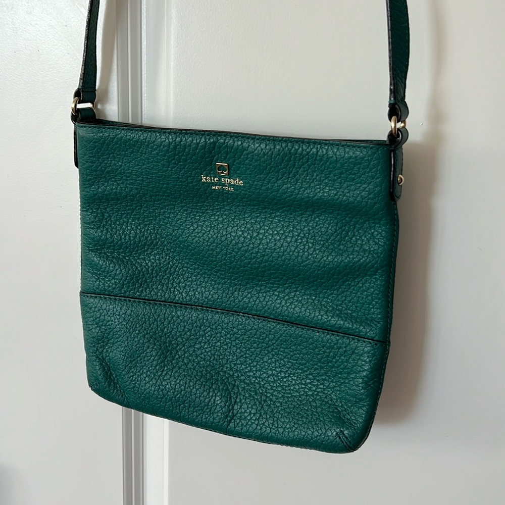 Kate Spate crossbody with adjustable strap.